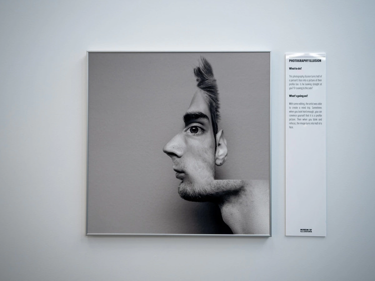 Photography Illusion shows both a man's profile and a frontal view of his face at Museum of Illusions Atlanta.
